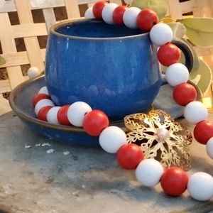 Blue ceramic cup with saucer